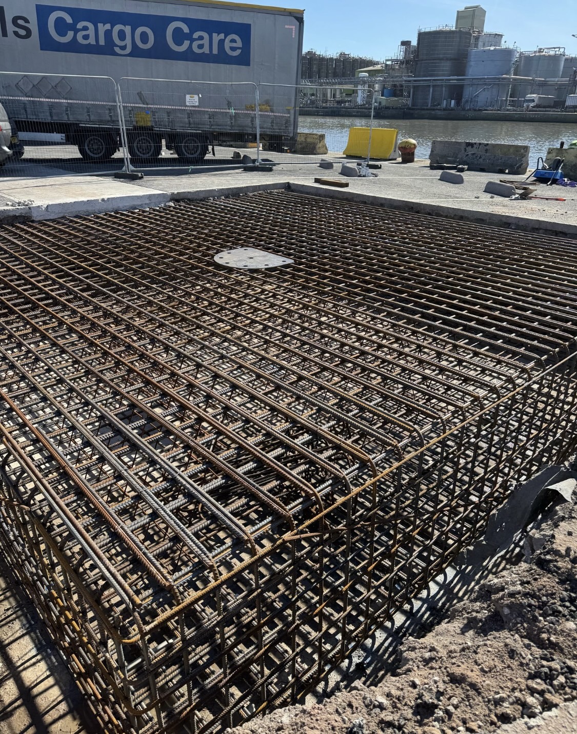 Heavy reinforced concrete foundation cage on an industrial waterside site